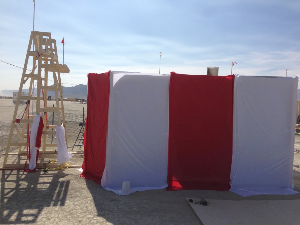 Bunting cloth staging.  (l-r chair,bunting,red,white,red,white)
