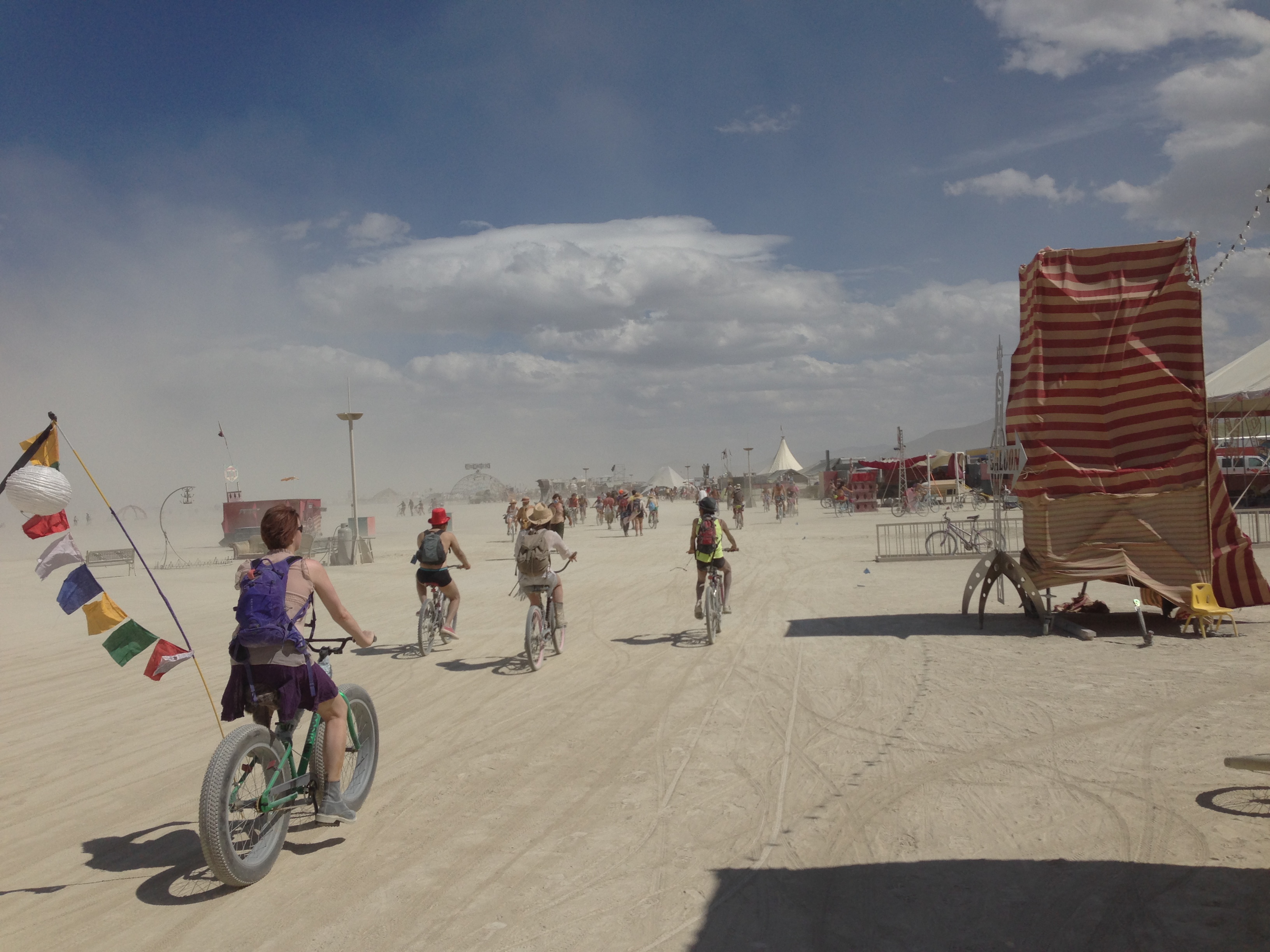 Riding along the Esplanade, trying to capture the feeling.  (Also, wide 'playa tires' in the foreground.)