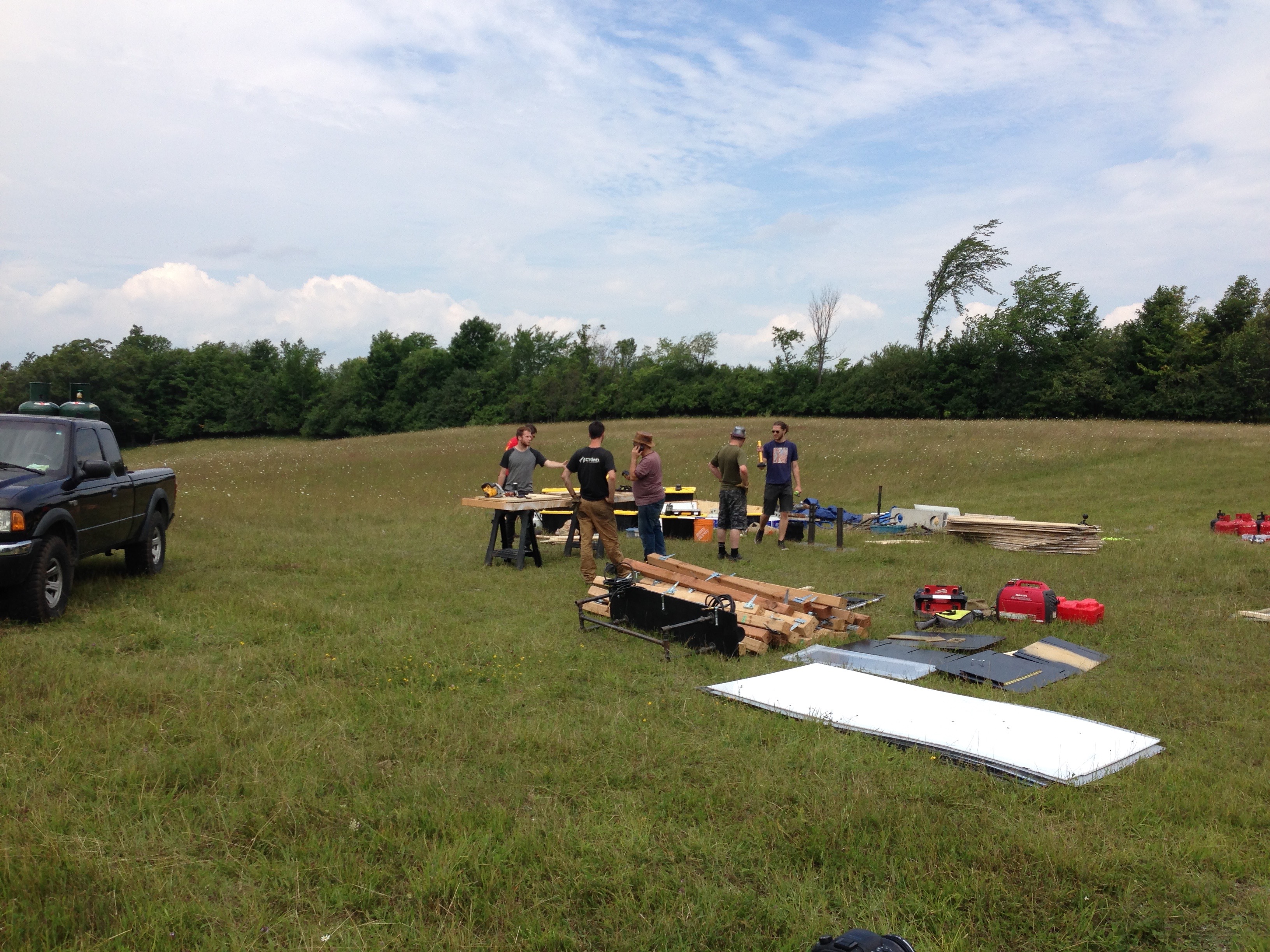 The unloading depot for the back field.  In the foreground, you can see a selection of parts from Francis and Mirror Blaze.  Background l-r: Case, Seth, Patrick, Rob, Fee, John.