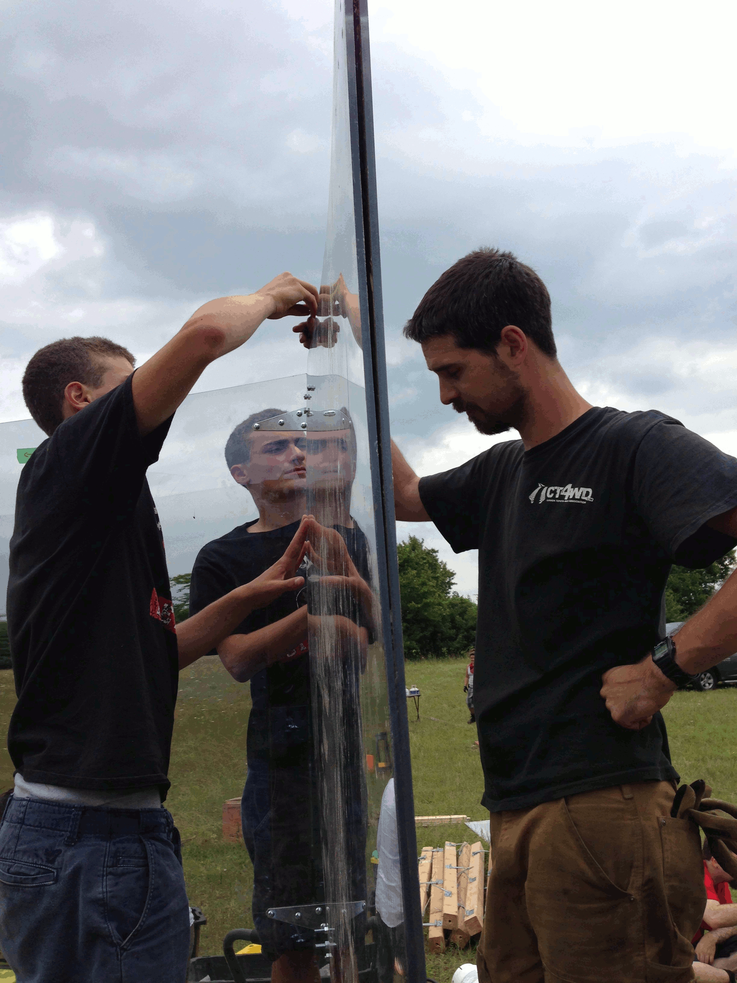 Alex and Patrick work on one of the tricky double mirrors.