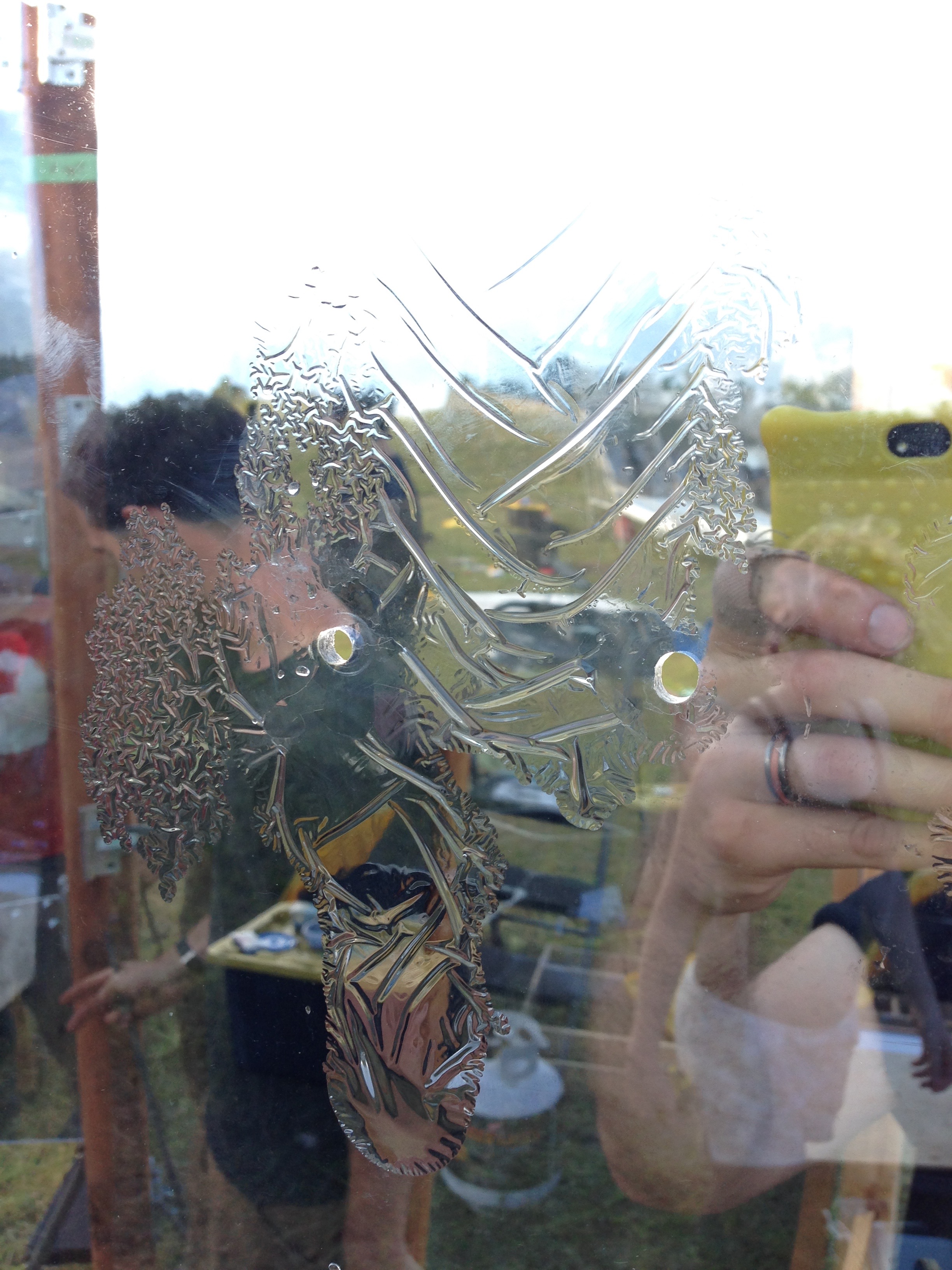 An example of the damage caused to two-way mirrors by water we think through the drilled holes.